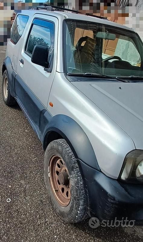 Second-hand Suzuki Jimny 80 CP (58 kW) 2000 Gri SUV