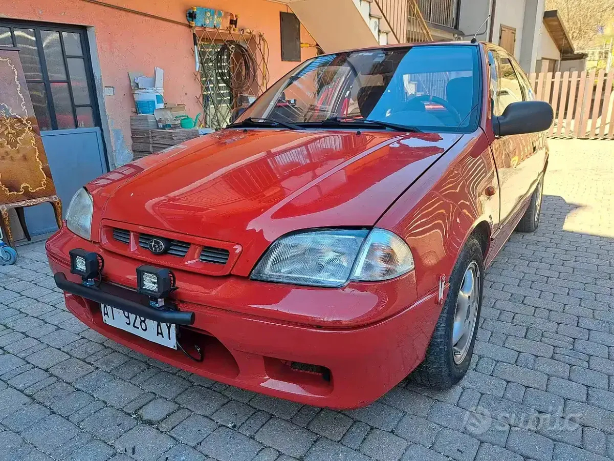 Usata Subaru Justy 68 CV (50 kW) 1997 Rosso Utilitaria