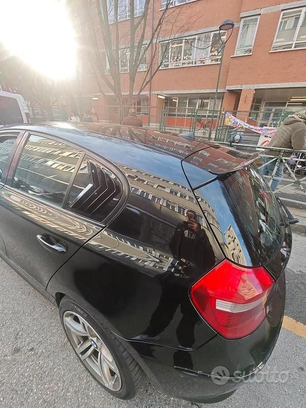 Usata BMW 120 177 CV (130 kW) 2010 Nero Utilitaria