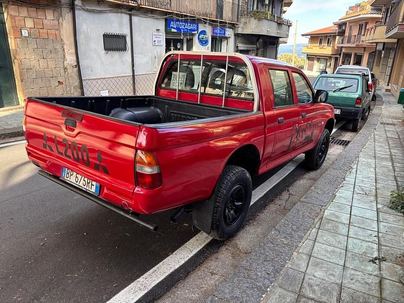 Usata Mitsubishi L200 115 CV (84 kW) 2002 Rosso Pick-up