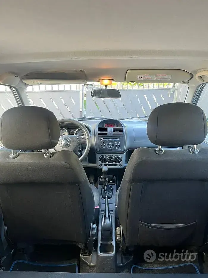 Usado Suzuki Ignis 99 CV (72 kW) 2005 Gris Utilitario
