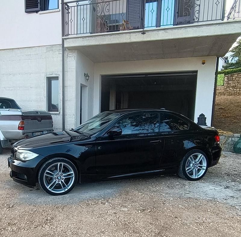 Nero Usata 2012 BMW 123 M Sport Due volumi | 11.999 € (Buon prezzo) - Immagine 1/4