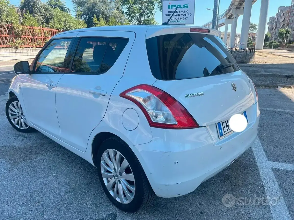 Usata Suzuki Swift 75 CV (55 kW) 2013 Bianco Utilitaria