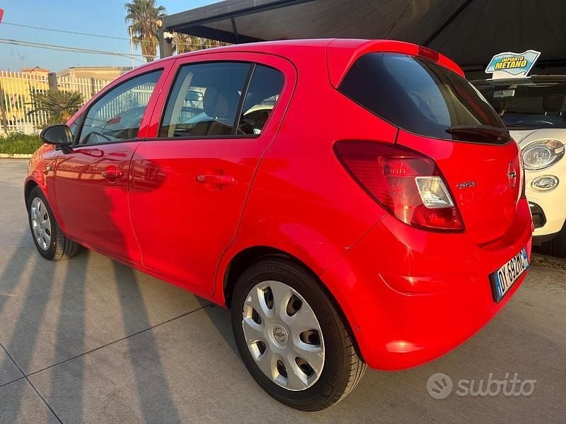 Usata Opel Corsa 74 CV (54 kW) 2009 Rosso Utilitaria