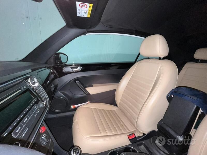 Begagnad VW Beetle Cabriolet 105 HK (77 kW) 2014 Svart Cab