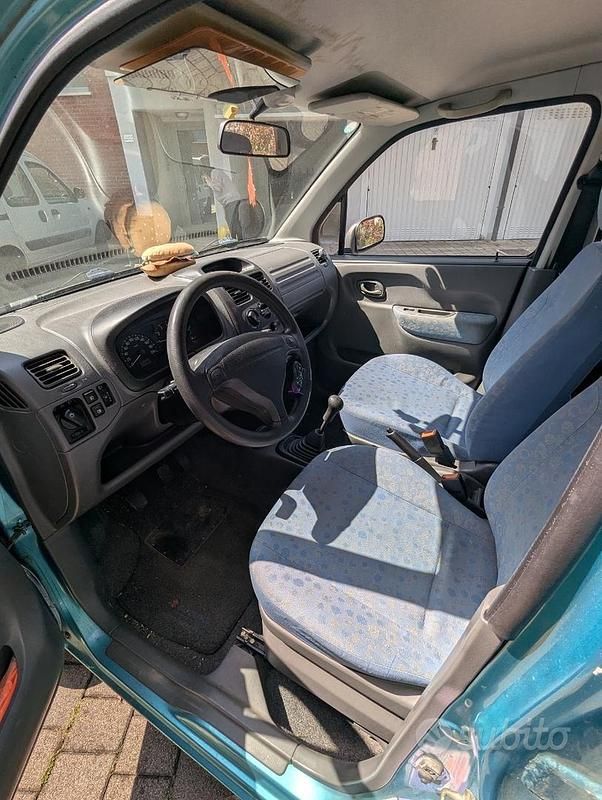 Second-hand Suzuki Wagon R+ 76 CP (55 kW) 2002 Albastru Monovolum