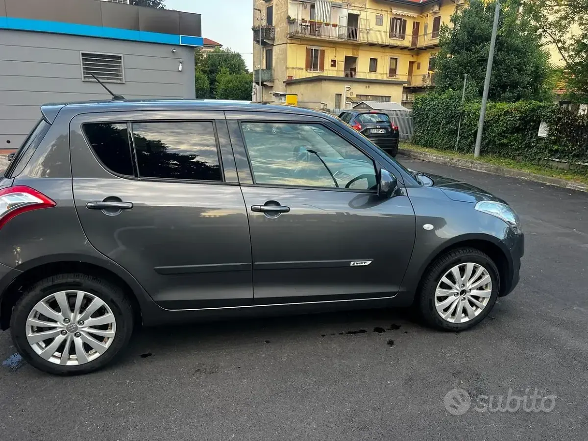 Usata Suzuki Swift 94 CV (69 kW) 2013 Grigio Utilitaria
