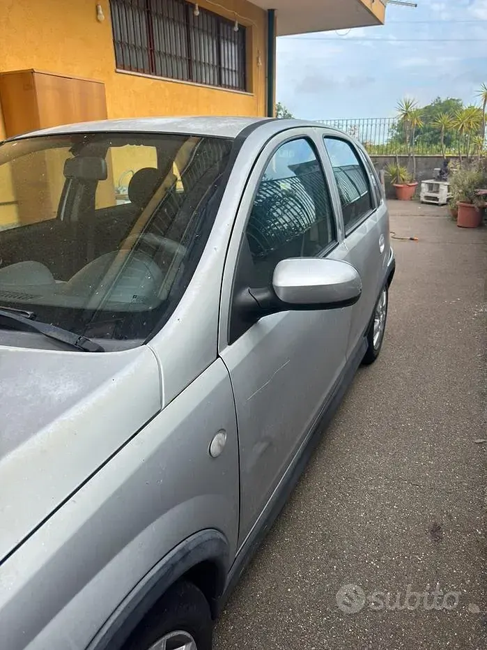 Używany Opel Corsa 69 KM (50 kW) 2006 Szary Hatchback