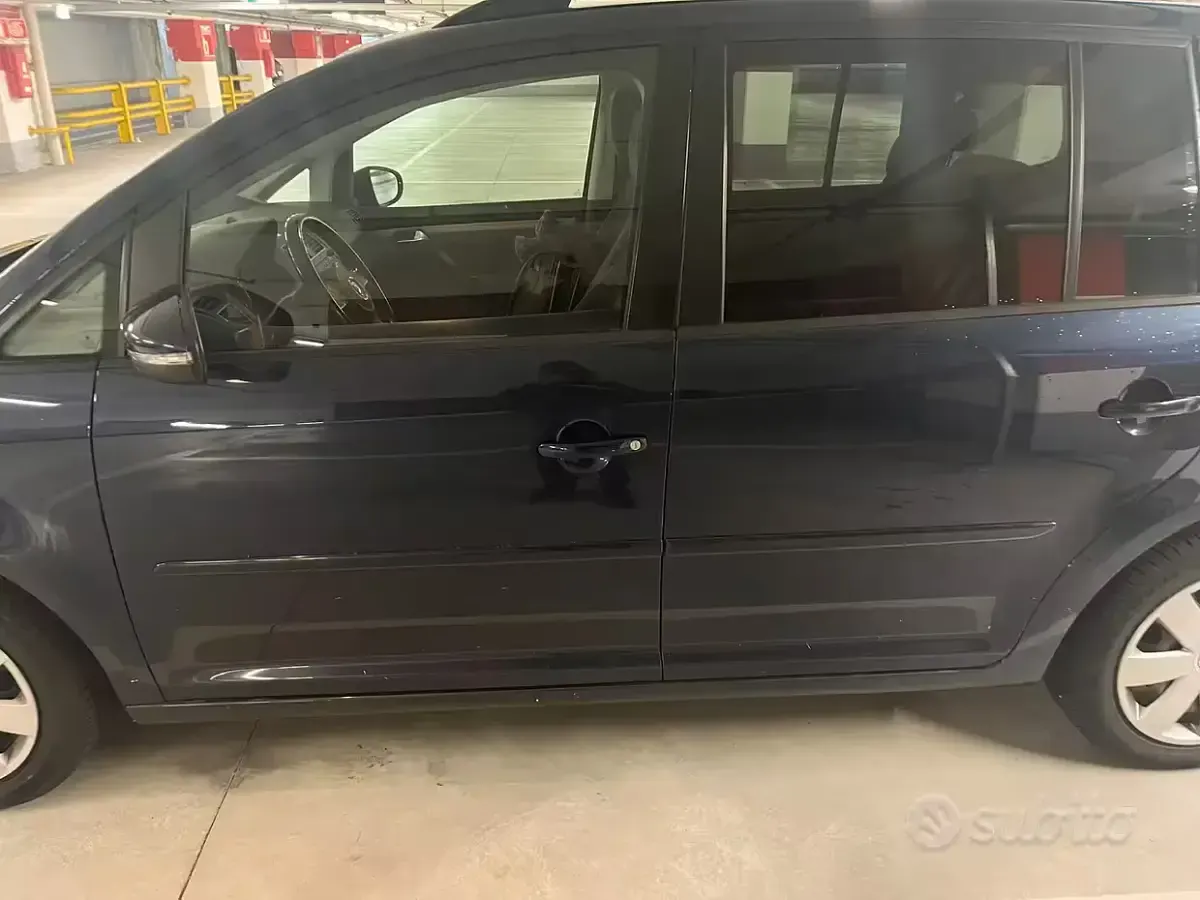 Usata VW Touran 102 CV (75 kW) 2014 Blu Monovolume