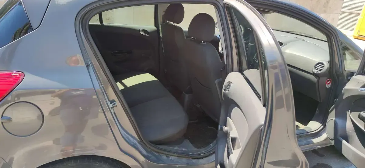 Usata Opel Corsa 86 CV (63 kW) 2013 Marrone Utilitaria