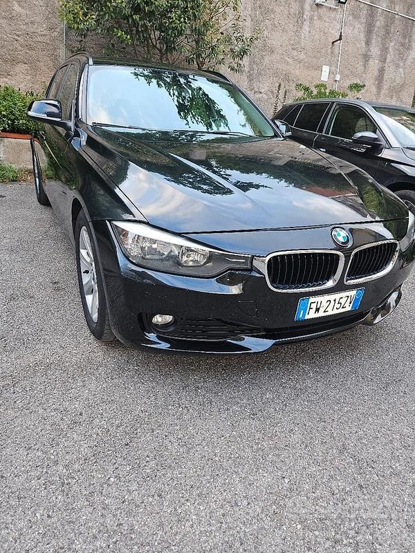 Nero Usata 2014 BMW 320 Station wagon | 8990 € (Buon prezzo) - Immagine 1/4