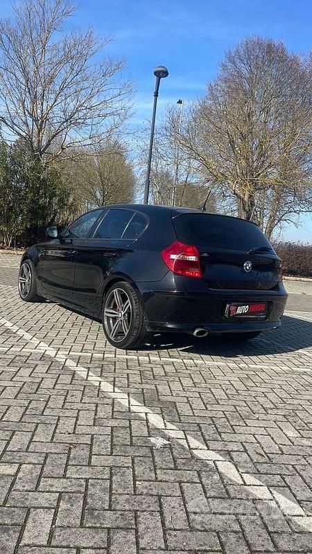 Usata BMW 120 177 CV (130 kW) 2010 Nero Utilitaria