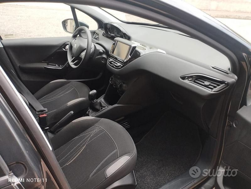 Usata Peugeot 208 68 CV (50 kW) 2014 Grigio Utilitaria
