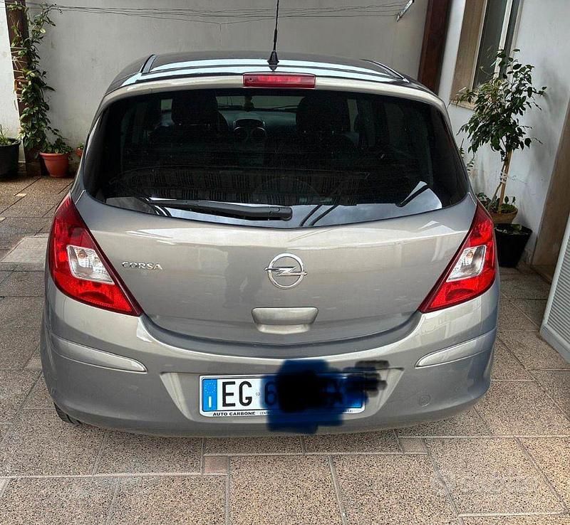 Usata Opel Corsa 54 CV (39 kW) 2011 Grigio Utilitaria