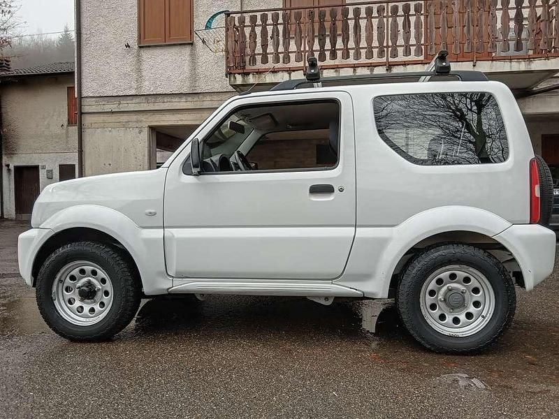 Second-hand Suzuki Jimny 86 CP (63 kW) 2013 Alb SUV