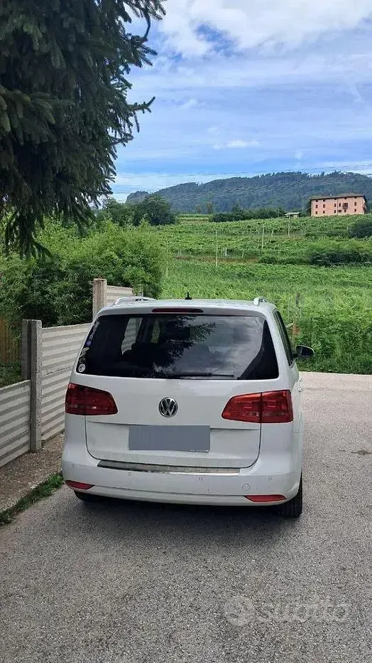 Usata VW Touran 105 CV (77 kW) 2014 Bianco Monovolume