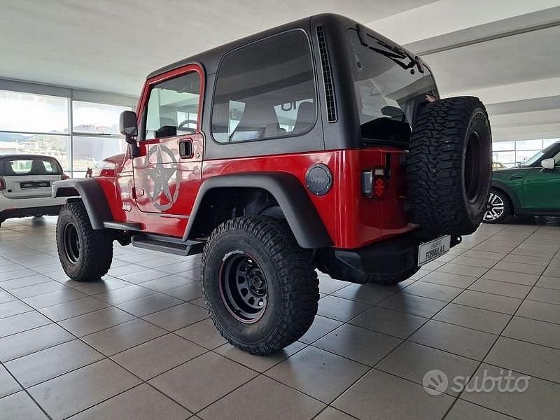 Occasion Jeep Wrangler Sport 177 ch (130 kW) 1999 Rouge SUV