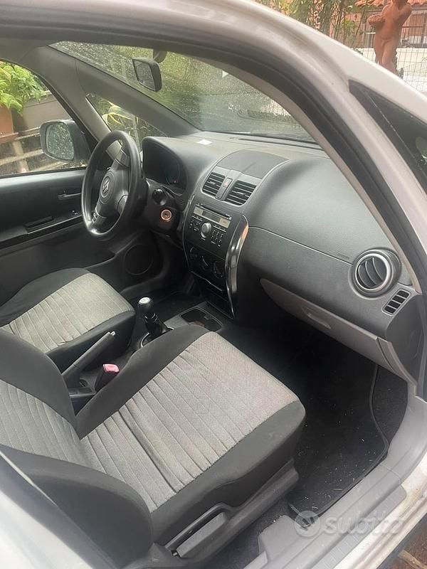 Usata Suzuki SX4 107 CV (78 kW) 2013 Bianco Berlina