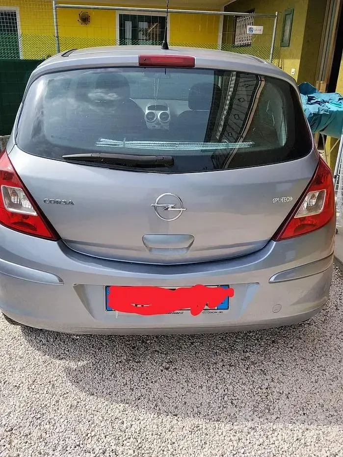 Usata Opel Corsa 80 CV (58 kW) 2010 Grigio Utilitaria