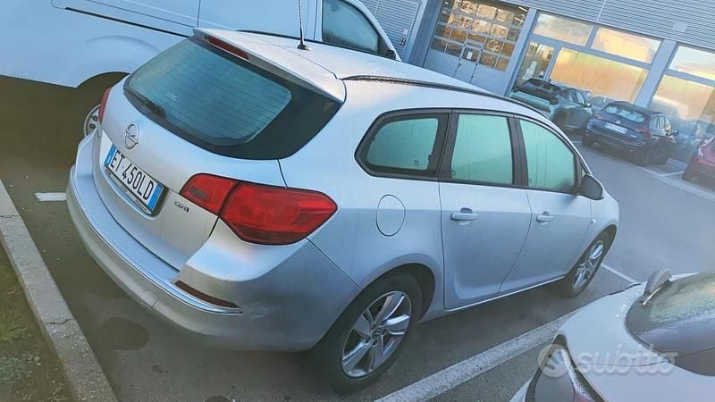 Gebraucht Opel Astra 110 PS (80 kW) 2013 Grau Kombi