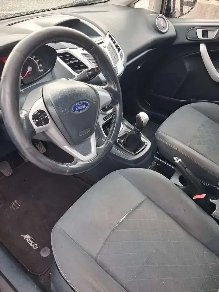Usata Ford Fiesta Titanium 69 CV (50 kW) 2012 Grigio Berlina