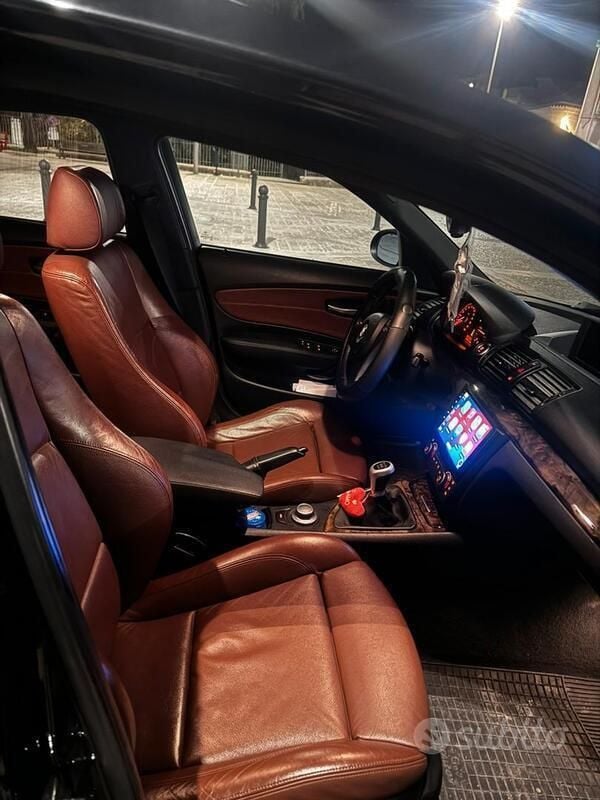 Usata BMW 120 177 CV (130 kW) 2010 Nero Utilitaria