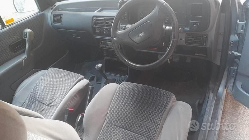 Begagnad Ford Escort Cabriolet 1990 Cab