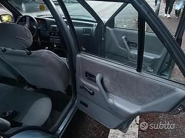 Usata Ford Escort 73 CV (53 kW) 1990 Bianco Berlina