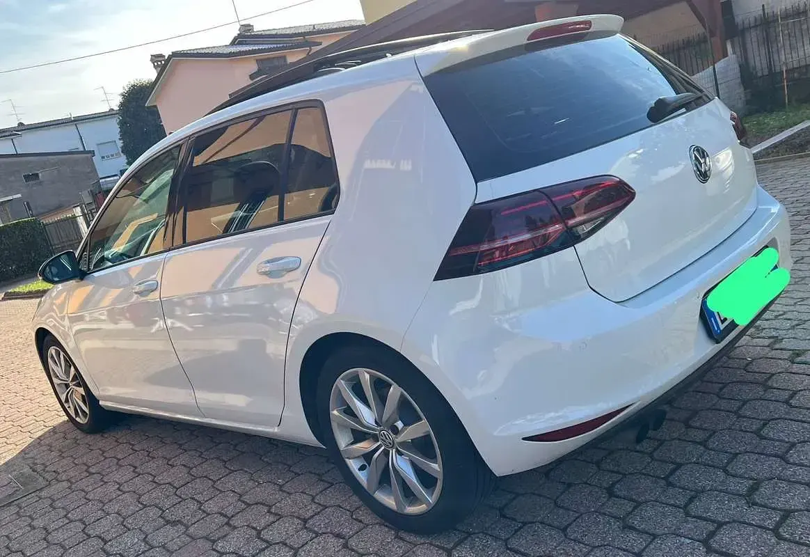 Second-hand VW Golf VII Highline 125 CP (91 kW) 2015 Alb Berlinǎ