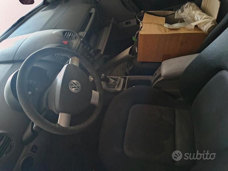 Usata VW New Beetle 101 CV (74 kW) 2004 Grigio Utilitaria