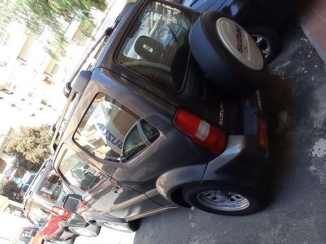 Usata Suzuki Jimny 86 CV (63 kW) 2010 Grigio scuro SUV