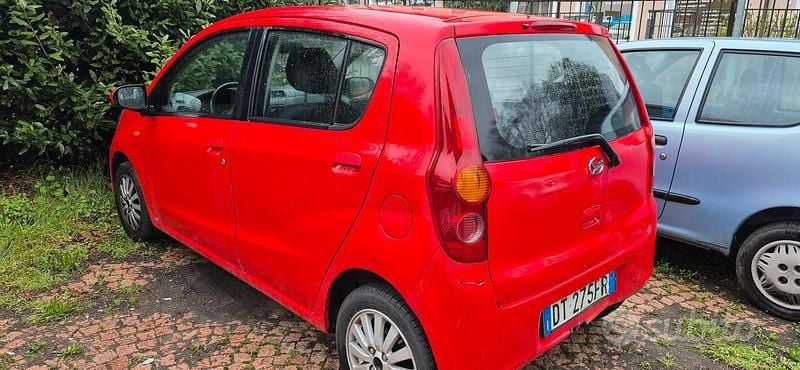 Usata Daihatsu Cuore HIRO 69 CV (50 kW) 2008 Rosso Utilitaria