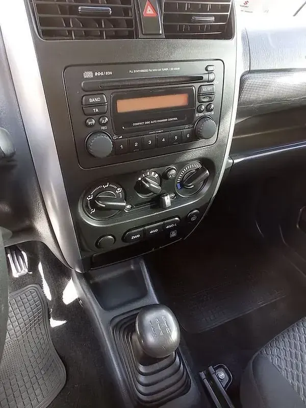 Usata Suzuki Jimny 86 CV (63 kW) 2010 Grigio scuro SUV