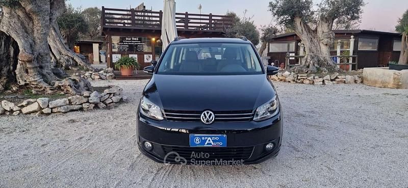 Begagnad VW Touran Comfortline 105 HK (77 kW) 2013 Svart Minibuss