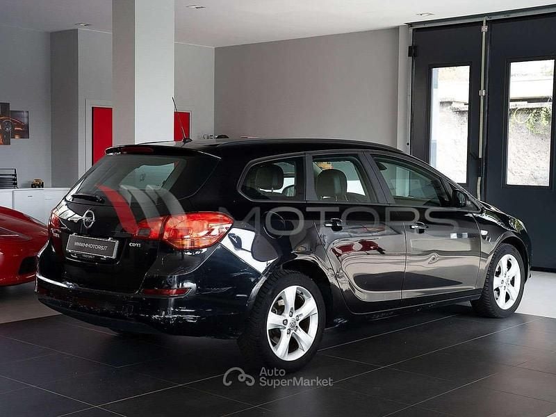 Usata Opel Astra 110 CV (80 kW) 2011 Nero Station wagon