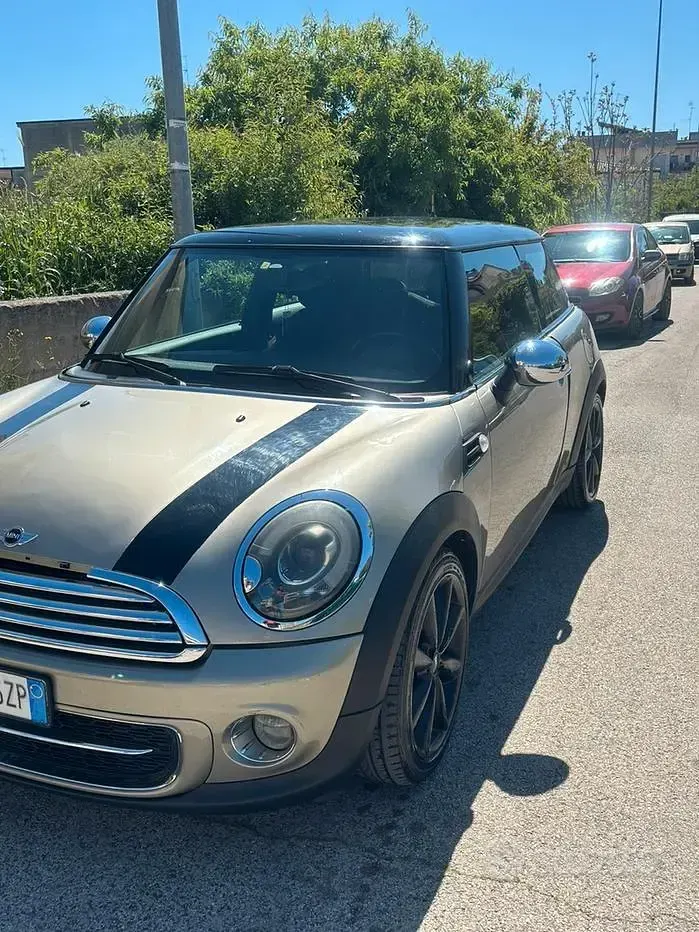 Begagnad Mini Cooper 112 HK (82 kW) 2011 Brun Halvkombi
