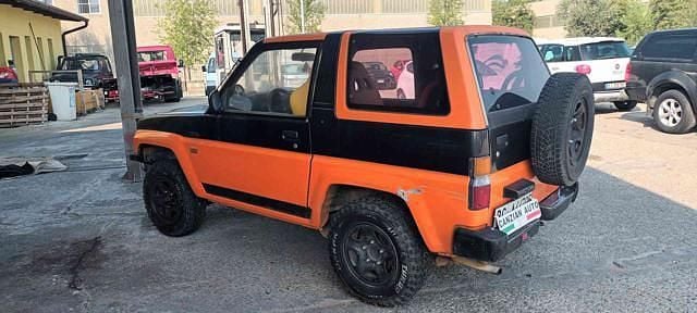 Usata Daihatsu Feroza 95 CV (69 kW) 1990 Arancione SUV