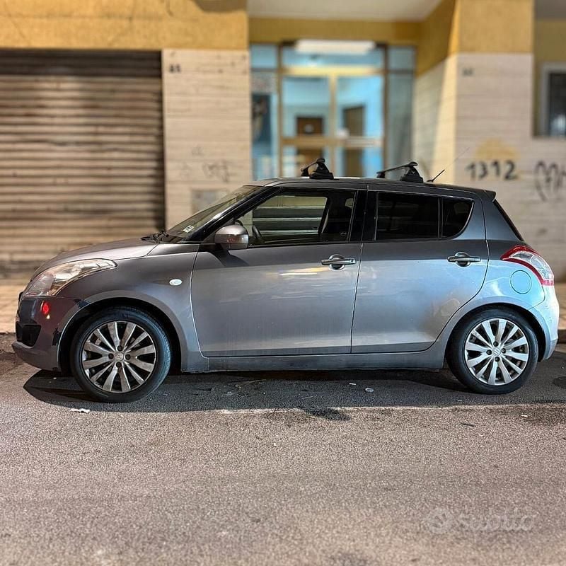 Usata Suzuki Swift 94 CV (69 kW) 2010 Grigio Utilitaria