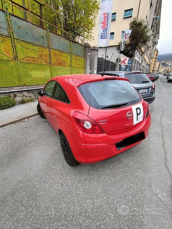 Używany Opel Corsa 85 KM (62 kW) 2012 Czerwony Hatchback