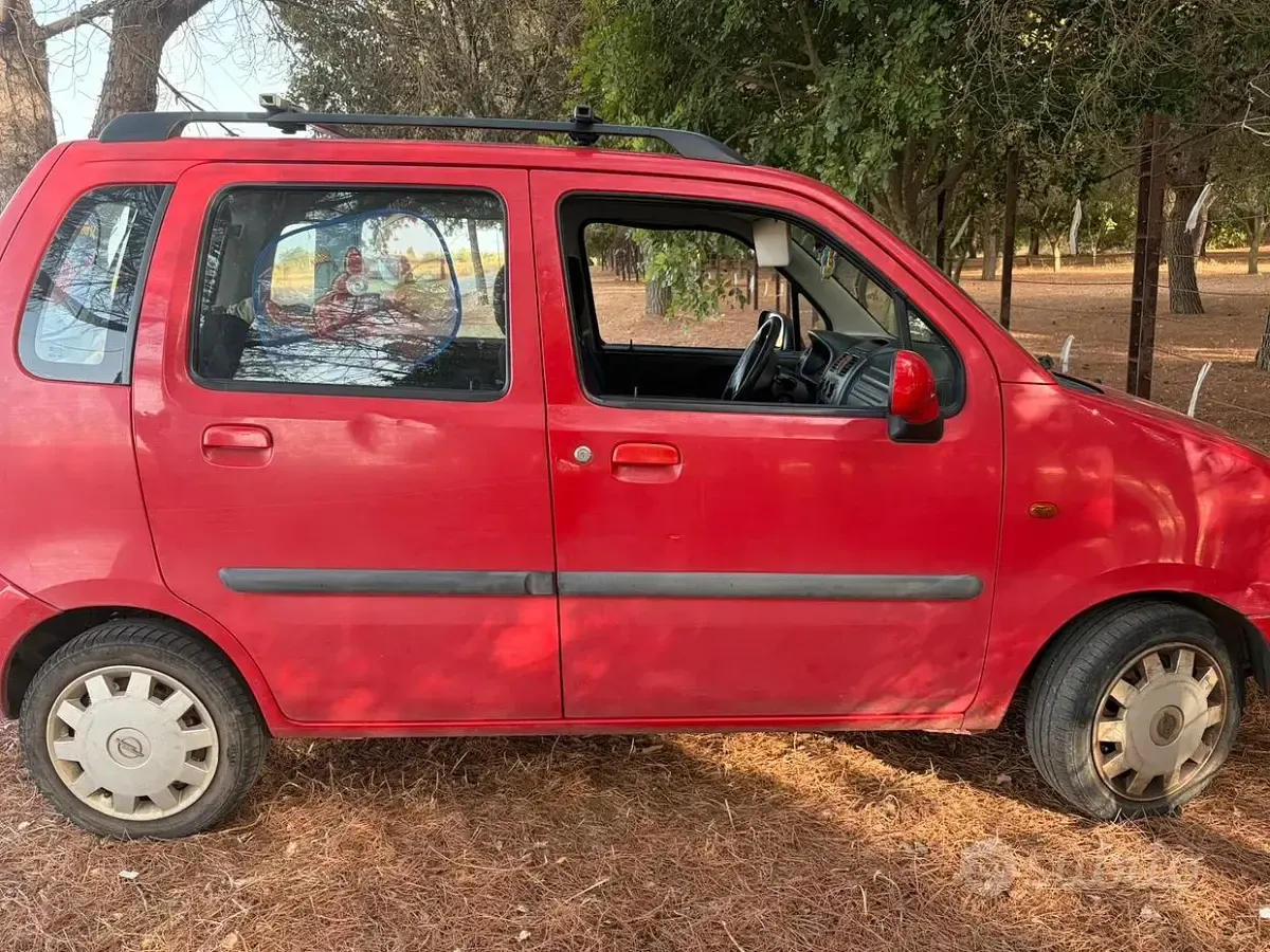 Usata Opel Agila 58 CV (42 kW) 2005 Rosso Monovolume