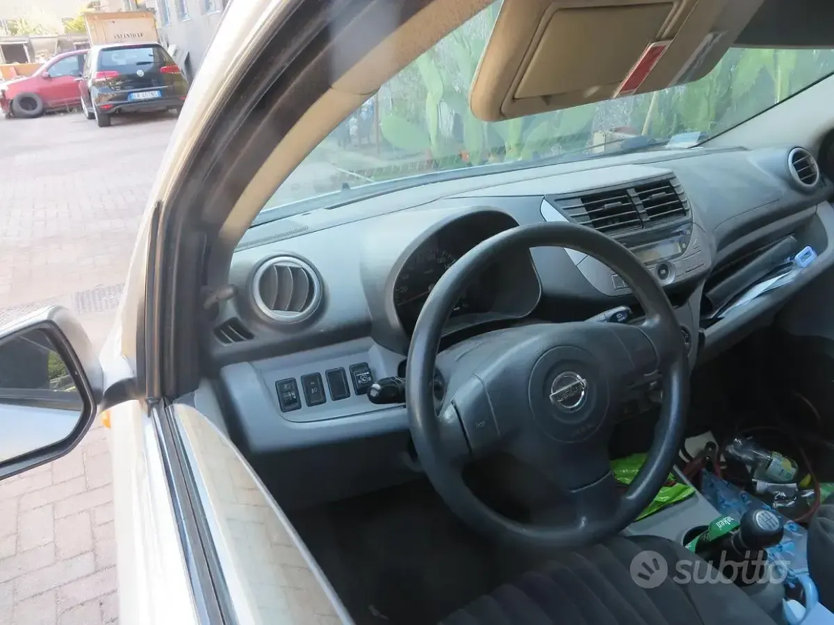 Usata Nissan Pixo 68 CV (50 kW) 2011 Grigio Utilitaria
