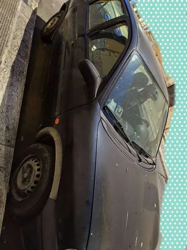 Usata Opel Corsa Swing 54 CV (39 kW) 1999 Nero Berlina