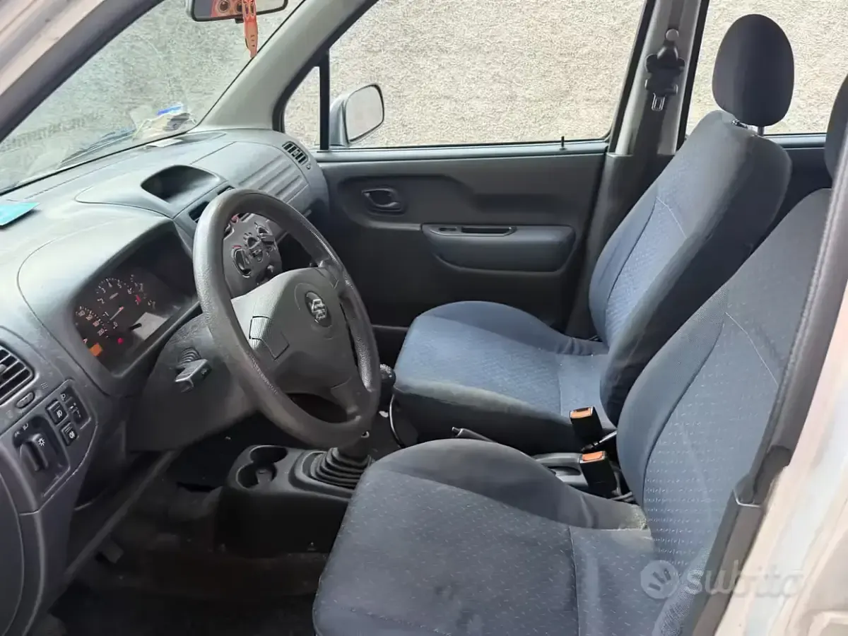 Usata Suzuki Wagon R+ 94 CV (69 kW) 2004 Grigio Monovolume