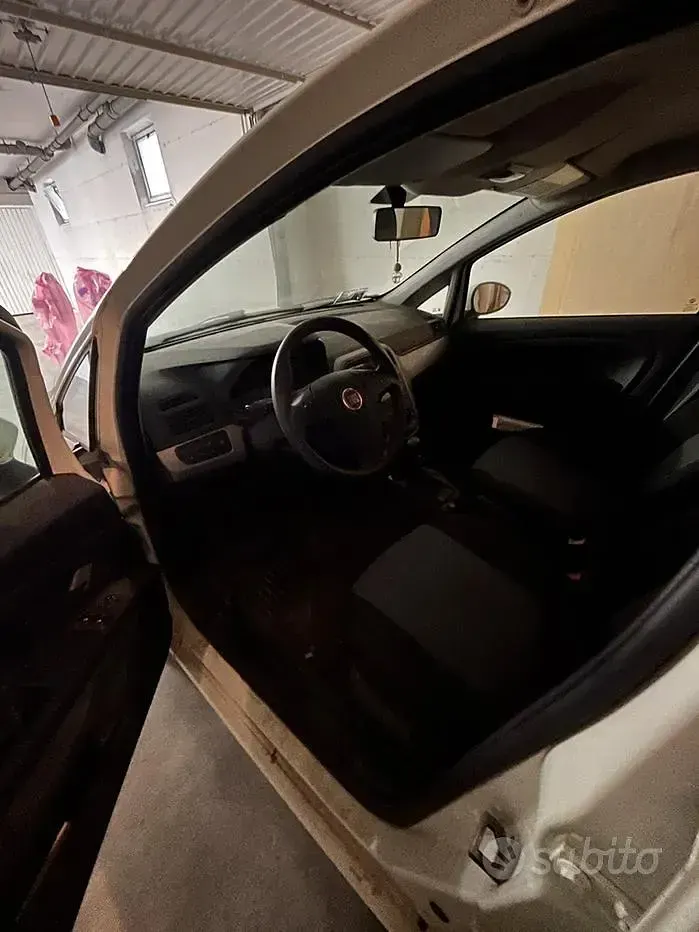 Usata Fiat Grande Punto 77 CV (56 kW) 2013 Bianco Utilitaria