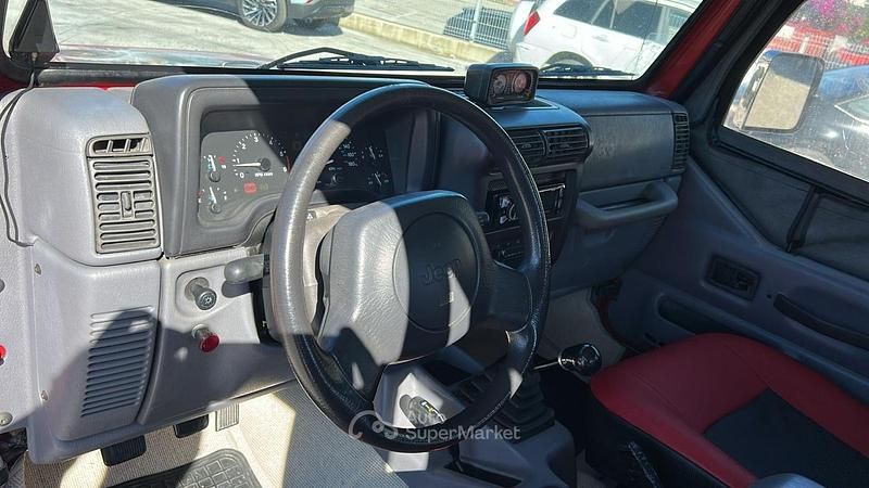 Usata Jeep Wrangler 118 CV (86 kW) 1996 Rosso SUV