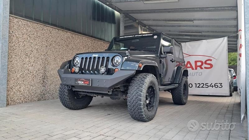 Nero Usata 2013 Jeep Wrangler Sport SUV | 33.999 € (Cara) - Immagine 1/4