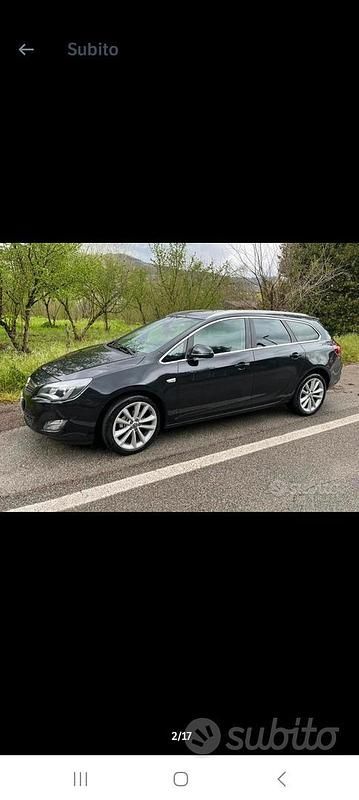Usata Opel Astra 120 CV (88 kW) 2012 Nero Station wagon