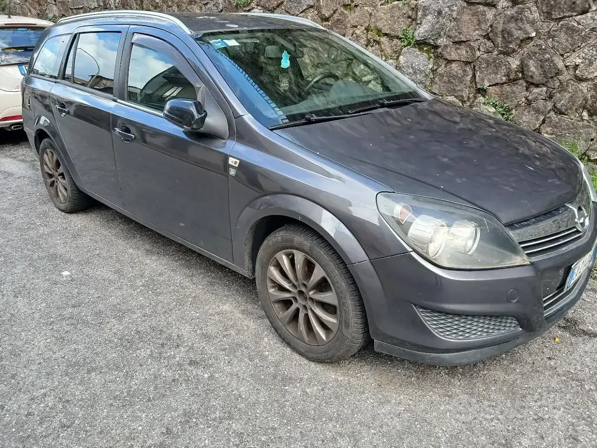 Usata Opel Astra 110 CV (80 kW) 2010 Grigio Station wagon