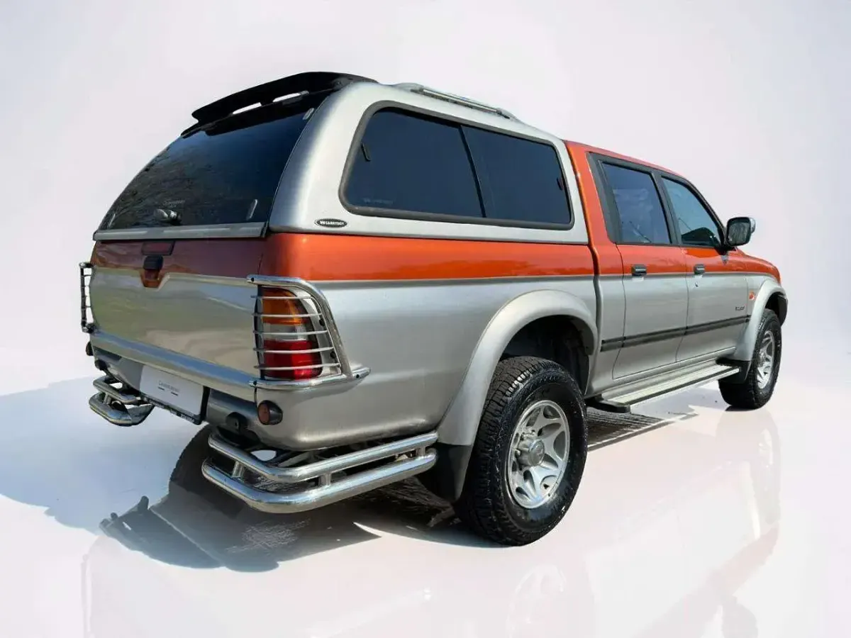 Occasion Mitsubishi L200 101 ch (74 kW) 2000 Orange Pick-up