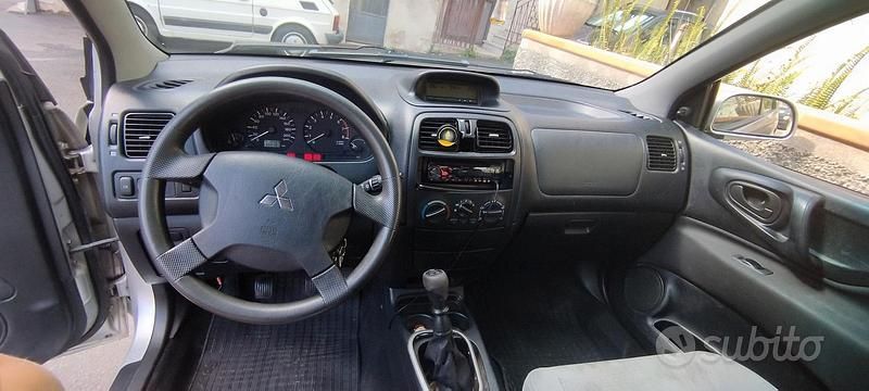 Usata Mitsubishi Space Star 82 CV (60 kW) 2003 Grigio Monovolume